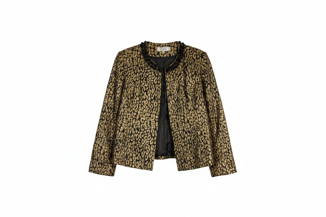 A cropped leopard-print blazer in metallic gold and black.