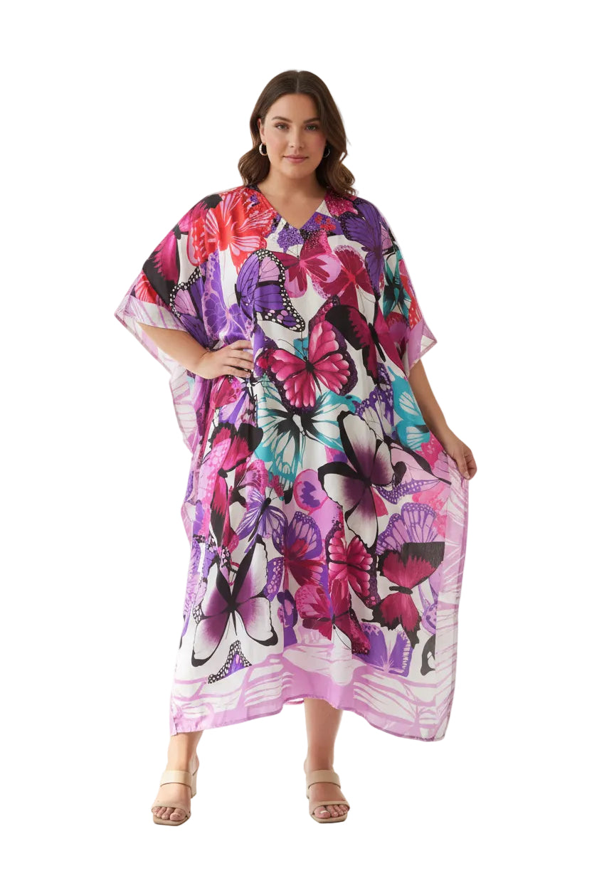 A short-sleeve kaftan dress with a vibrant butterfly print in shades of purple, pink, red, and blue.
