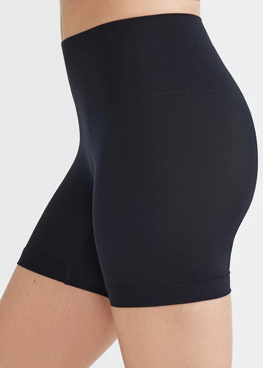 black high-waisted compression shorts.